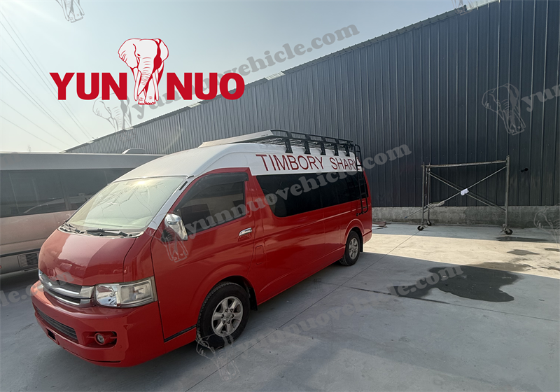 The eye-catching red used Toyota HiAce is customized for the Malian client