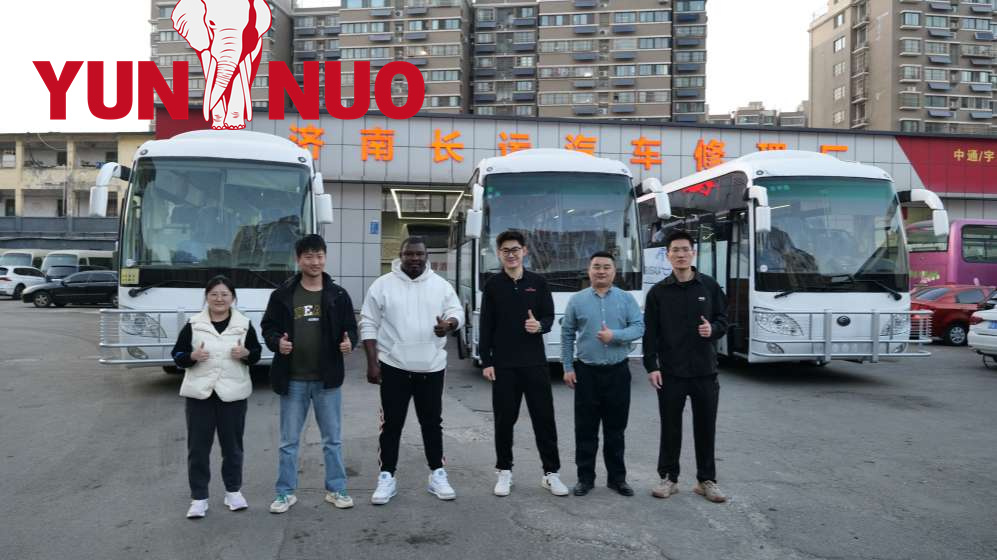The clients from Chad come to inspect the four buses they have purchased